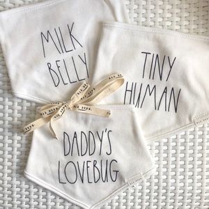 Rae Dunn Cream Baby Bibs with Playful Text